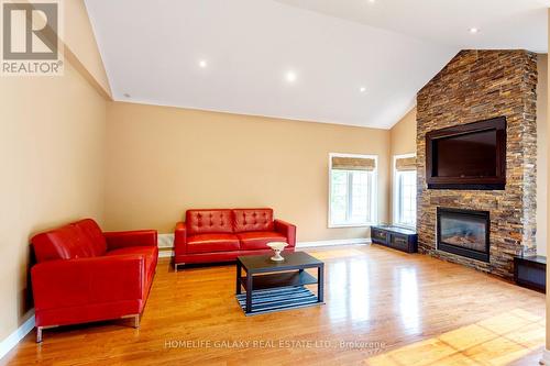 6 Basswood Drive, Wasaga Beach, ON - Indoor Photo Showing Living Room With Fireplace