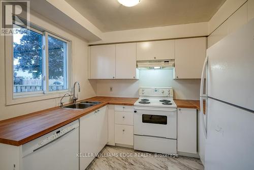 4 - 394 Springbank Avenue, Woodstock, ON - Indoor Photo Showing Kitchen With Double Sink