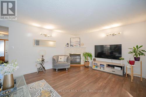 84 Wimbleton Crescent, Kitchener, ON - Indoor Photo Showing Living Room With Fireplace