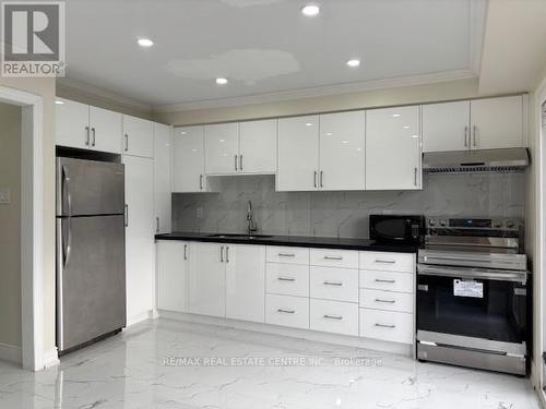 157 Ecclestone Drive, Brampton, ON - Indoor Photo Showing Kitchen With Double Sink