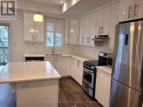 38 - 70 Plains Road W, Burlington, ON - Indoor Photo Showing Kitchen With Double Sink