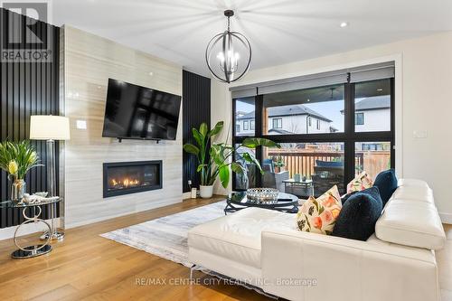 1754 Brayford Avenue, London, ON - Indoor Photo Showing Living Room With Fireplace