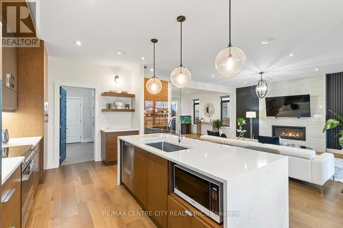 1754 Brayford Avenue, London, ON - Indoor Photo Showing Kitchen With Fireplace With Upgraded Kitchen