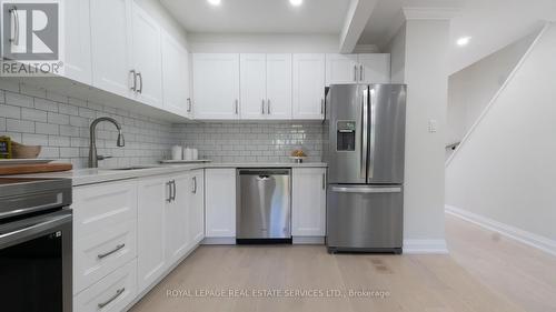 17 - 2411 Sovereign Street, Oakville, ON - Indoor Photo Showing Kitchen With Stainless Steel Kitchen With Upgraded Kitchen