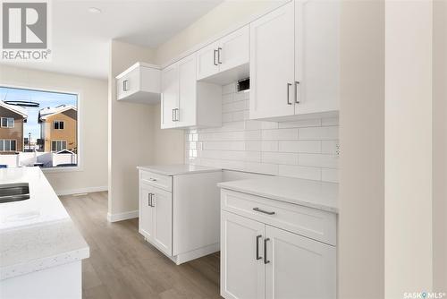 3127 Green Brook Road, Regina, SK - Indoor Photo Showing Kitchen With Double Sink