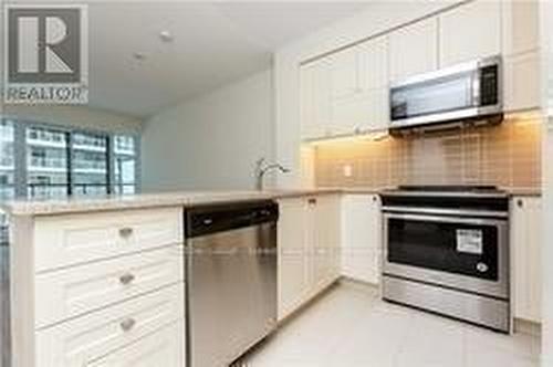 309 - 39 Annie Craig Drive, Toronto, ON - Indoor Photo Showing Kitchen