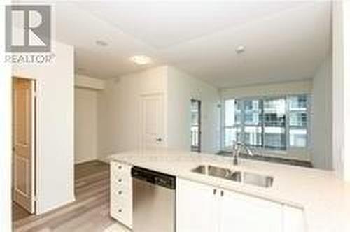 309 - 39 Annie Craig Drive, Toronto, ON - Indoor Photo Showing Kitchen