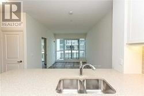 309 - 39 Annie Craig Drive, Toronto, ON - Indoor Photo Showing Kitchen With Double Sink