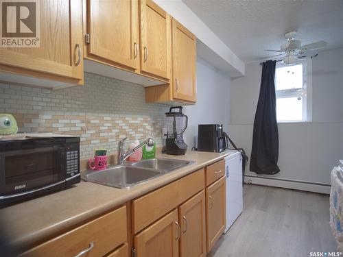 103 3094 5Th Avenue E, Prince Albert, SK - Indoor Photo Showing Kitchen With Double Sink