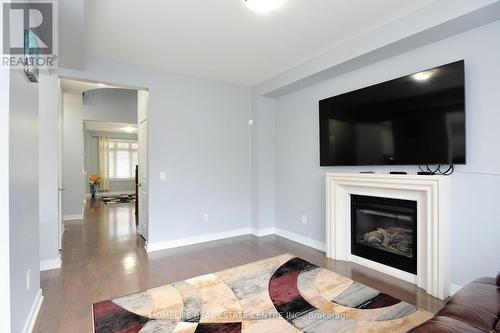 11 Villadowns Trail, Brampton, ON - Indoor Photo Showing Living Room With Fireplace