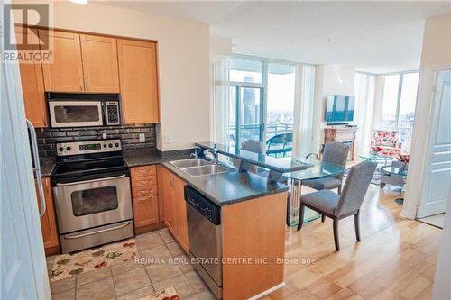 2402 - 220 Burnhamthorpe Road W, Mississauga, ON - Indoor Photo Showing Kitchen With Double Sink