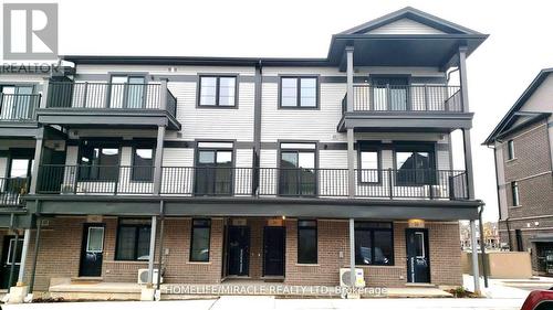 38 Oat Lane, Kitchener, ON - Outdoor With Balcony With Facade