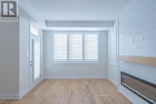 317 Mullighan Gardens, Smith-Ennismore-Lakefield, ON - Indoor Photo Showing Other Room With Fireplace