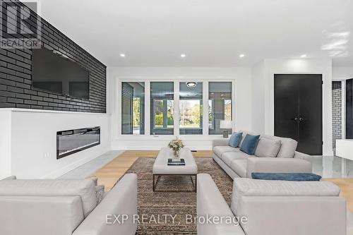 22 Whitehill Avenue, Ottawa, ON - Indoor Photo Showing Living Room With Fireplace