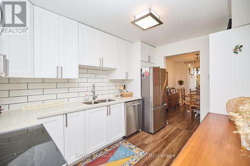 106 - 189 Dorchester Boulevard, St. Catharines (444 - Carlton/Bunting), ON - Indoor Photo Showing Kitchen With Stainless Steel Kitchen With Double Sink With Upgraded Kitchen