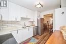 106 - 189 Dorchester Boulevard, St. Catharines (444 - Carlton/Bunting), ON  - Indoor Photo Showing Kitchen With Stainless Steel Kitchen With Double Sink With Upgraded Kitchen 