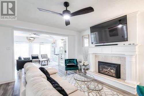 47 Butterfield Crescent, Whitby, ON - Indoor Photo Showing Living Room With Fireplace