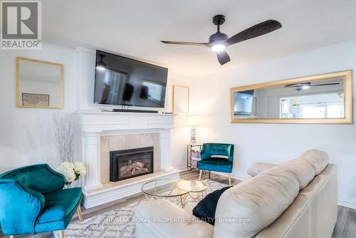 47 Butterfield Crescent, Whitby, ON - Indoor Photo Showing Living Room With Fireplace