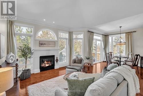 1907 Caprihani Way, Ottawa, ON - Indoor Photo Showing Living Room With Fireplace