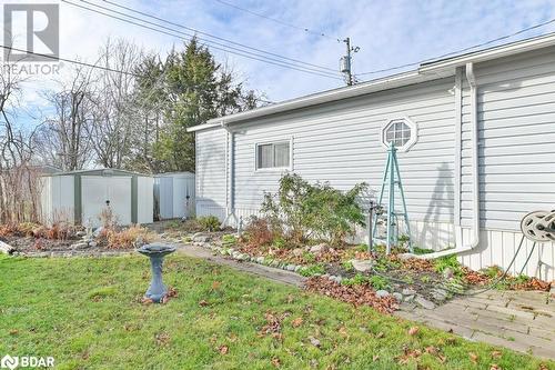 View of side of property with a yard and a shed - 30 Kenneth Boulevard, Quinte West, ON - Outdoor