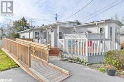 View of front of home featuring a deck - 