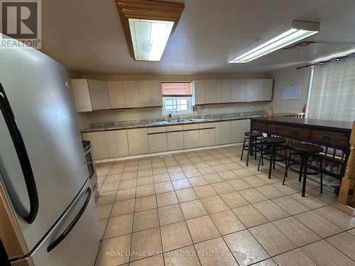 4 Baron Street, Kirkland Lake (Kl & Area), ON - Indoor Photo Showing Kitchen With Double Sink