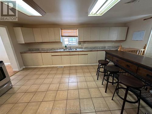 4 Baron Street, Kirkland Lake (Kl & Area), ON - Indoor Photo Showing Kitchen With Double Sink