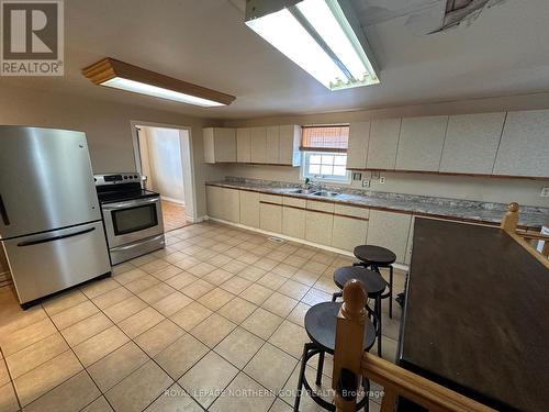 4 Baron Street, Kirkland Lake (Kl & Area), ON - Indoor Photo Showing Kitchen With Double Sink