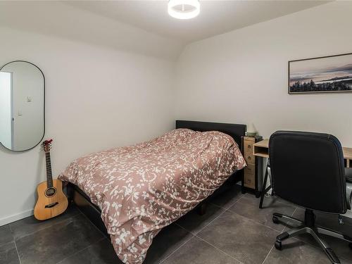 104-3089 Barons Rd, Nanaimo, BC - Indoor Photo Showing Bedroom