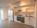 2519-275 Village Green Sq, Toronto, ON  - Indoor Photo Showing Kitchen With Stainless Steel Kitchen 