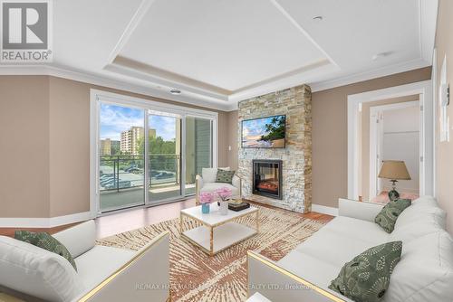 311 - 320 Sugarcreek Trail, London, ON - Indoor Photo Showing Living Room With Fireplace