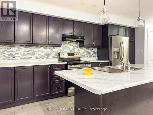 1045 Reflection Place S, Pickering, ON - Indoor Photo Showing Kitchen With Stainless Steel Kitchen With Double Sink With Upgraded Kitchen