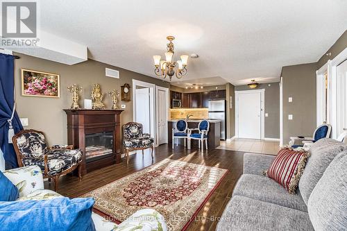 2402 - 6 Dayspring Circle, Brampton, ON - Indoor Photo Showing Living Room With Fireplace