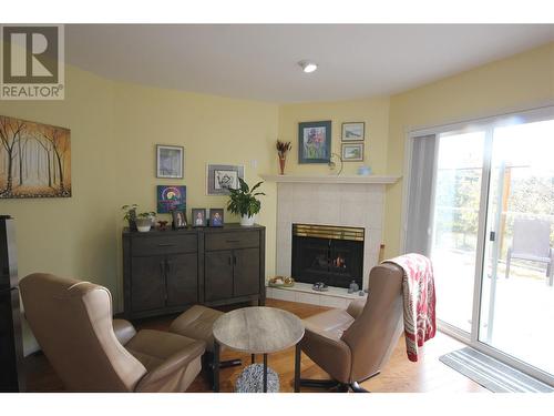 Great Room off Kitchen - 1634 Carmi Avenue Unit# 129, Penticton, BC - Indoor With Fireplace