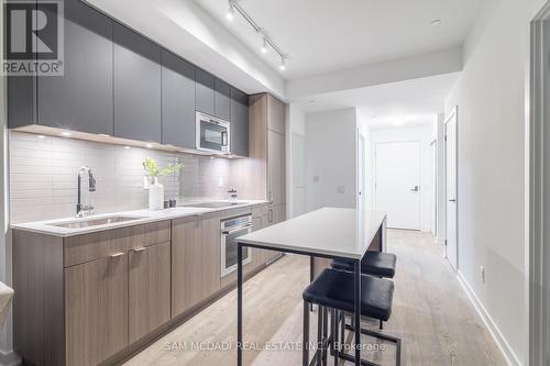 1412 - 220 Missinnihe Way, Mississauga, ON - Indoor Photo Showing Kitchen With Upgraded Kitchen