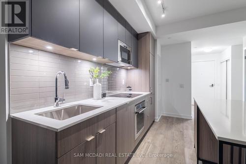 1412 - 220 Missinnihe Way, Mississauga, ON - Indoor Photo Showing Kitchen With Double Sink With Upgraded Kitchen