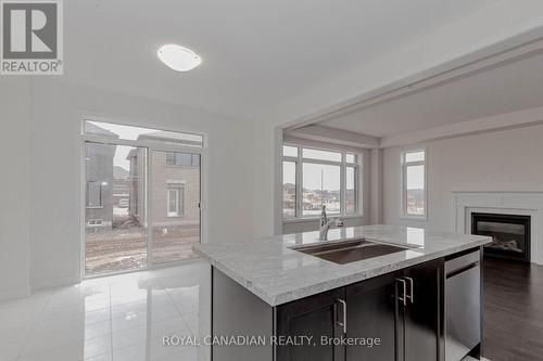 10 Spiers Road, Erin, ON - Indoor Photo Showing Kitchen With Fireplace With Upgraded Kitchen