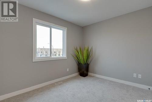 126 Kostiuk Crescent, Saskatoon, SK - Indoor Photo Showing Other Room