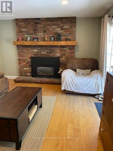 40.5 Victoria Street N, Kawartha Lakes (Lindsay), ON - Indoor With Fireplace