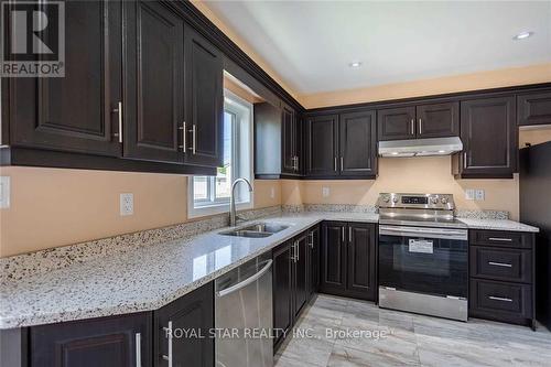 8105 Reilly Street, Niagara Falls, ON - Indoor Photo Showing Kitchen With Double Sink