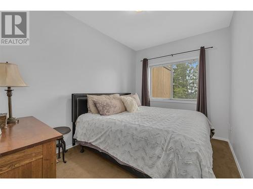 5882 Snow Pines Crescent Unit# A, Kelowna, BC - Indoor Photo Showing Bedroom