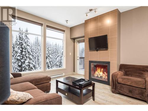 30 Monashee Road Unit# 310, Silver Star, BC - Indoor Photo Showing Living Room With Fireplace