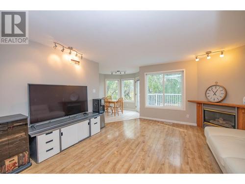 10580 Bonnie Drive, Lake Country, BC - Indoor Photo Showing Living Room With Fireplace