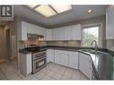 10580 Bonnie Drive, Lake Country, BC  - Indoor Photo Showing Kitchen With Double Sink 