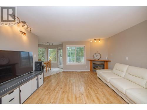 10580 Bonnie Drive, Lake Country, BC - Indoor Photo Showing Living Room With Fireplace