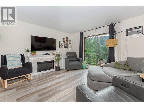 409 Main Street Unit# 302, Sicamous, BC - Indoor Photo Showing Living Room With Fireplace