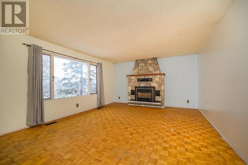 2047 Norwood Street, Prince George, BC - Indoor Photo Showing Living Room With Fireplace