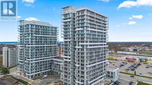 1306 - 65 Speers Road, Oakville, ON - Outdoor With Facade