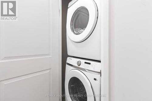 1306 - 65 Speers Road, Oakville, ON - Indoor Photo Showing Laundry Room