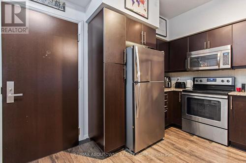 1306 - 65 Speers Road, Oakville, ON - Indoor Photo Showing Kitchen With Stainless Steel Kitchen